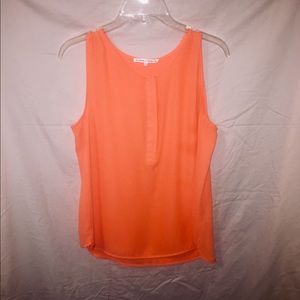 Sleeveless Peach Blouse.